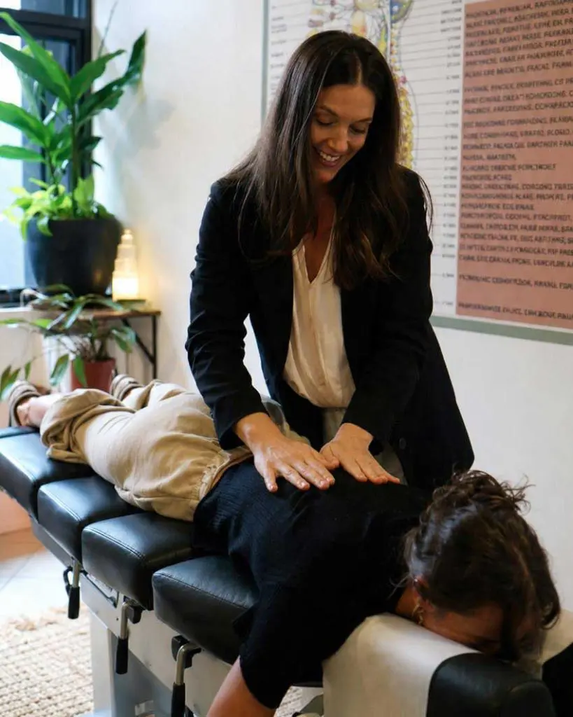 Dr. Jacqui with patient practicing Osteopathy