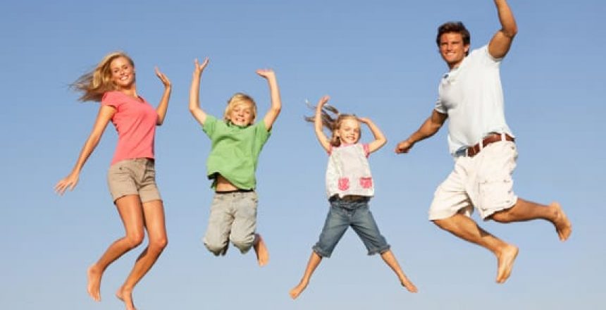 Family jumping for joy